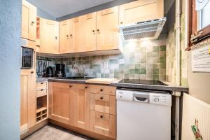 Kuchyň nebo kuchyňský kout v ubytování Appartement Morzine 1000 - 6 pers