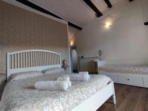 Postel nebo postele na pokoji v ubytování La Stregatta