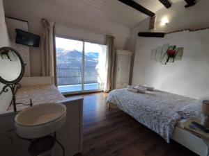 Postel nebo postele na pokoji v ubytování La Stregatta