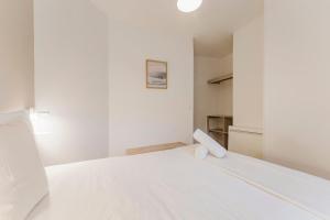 Postel nebo postele na pokoji v ubytování Lille Centre - Nice and functional ap.