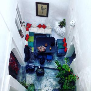 an overhead view of a room with a table and chairs at Dar Jiblia in Chefchaouene