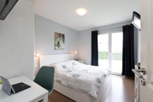 En eller flere senge i et værelse på Tap In