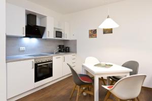 Η κουζίνα ή μικρή κουζίνα στο Am Hafen 3