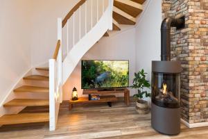 TV a/nebo společenská místnost v ubytování SEENsucht