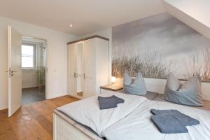 Postel nebo postele na pokoji v ubytování SEENsucht