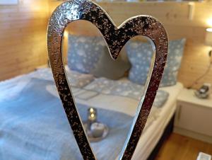 Ένα ή περισσότερα κρεβάτια σε δωμάτιο στο Tiny House "Wolke 7"