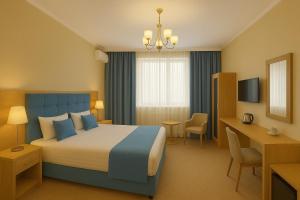 Ένα ή περισσότερα κρεβάτια σε δωμάτιο στο Khatai Deluxe Hotel