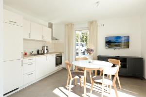 Køkken eller tekøkken på Haus an der Sonne EG 107