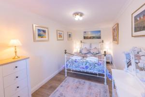 Ένα ή περισσότερα κρεβάτια σε δωμάτιο στο The Stables, Winksley Nr Grantley Hall