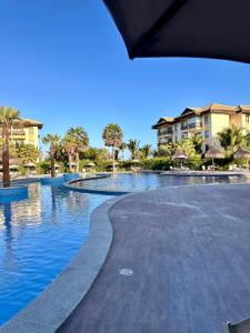 Bazén v ubytování Vg sun Cumbuco nebo v jeho okolí