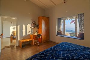 Postel nebo postele na pokoji v ubytování Villa KAILASA