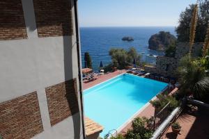 Bazén v ubytování Bay Palace Mazzarò nebo v jeho okolí