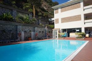 Bazén v ubytování Bay Palace Mazzarò nebo v jeho okolí