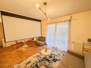 Χώρος καθιστικού στο Cosy Studio confortable près de Paris à Fontenay-sous-Bois