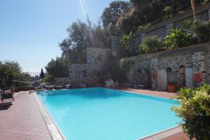 Bazén v ubytování Bay Palace Mazzarò nebo v jeho okolí