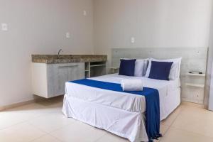 Postel nebo postele na pokoji v ubytování GoldMen Express Campos Goycatazes