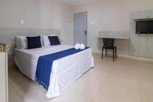 Postel nebo postele na pokoji v ubytování GoldMen Express Campos Goycatazes