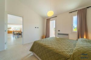 En eller flere senge i et værelse på Casa Luna - By Searly + 100 billeder