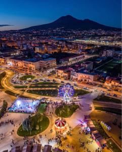 an aerial view of a city at night at Manfredi Apartments in Torre Annunziata