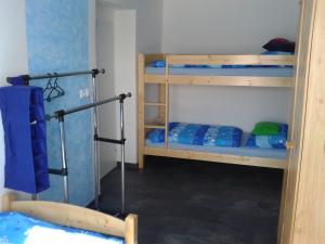 Palanda nebo palandy na pokoji v ubytování Apartmán Hastrmánek, Kvilda 3