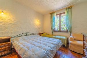 En eller flere senge i et værelse på Villetta Dante - By Searly