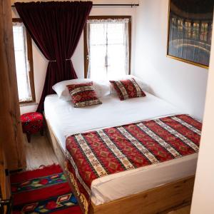 Ένα ή περισσότερα κρεβάτια σε δωμάτιο στο Hotel Ari Old Town