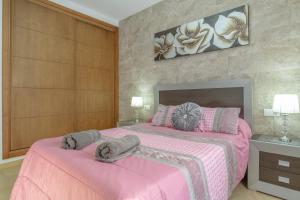 En eller flere senge i et værelse på La Casita de Leonardo + 12 billeder