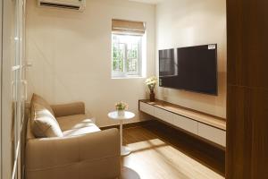 Et tv og/eller underholdning på CHOWA HOME - ApartHotel Thao Dien Area