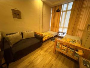 Afbeelding uit fotogalerij van Tamar's Apartment in Borjomi