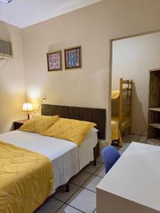 Кровать или кровати в номере Pousada Riosmar +53 фотографии