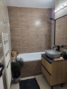 Et badeværelse på ALiVA Stay Apartment