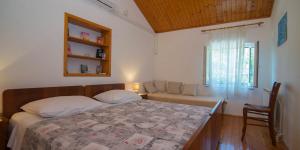 Ένα ή περισσότερα κρεβάτια σε δωμάτιο στο Teo