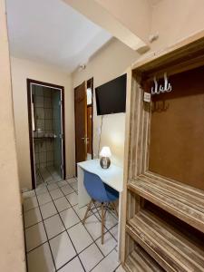 Телевизор и/или развлекательный центр в Pousada Riosmar