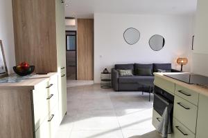 Køkken eller tekøkken på A Macchia - T2 nature & couché de soleil