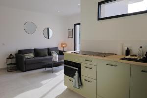 Køkken eller tekøkken på A Macchia - T2 nature & couché de soleil