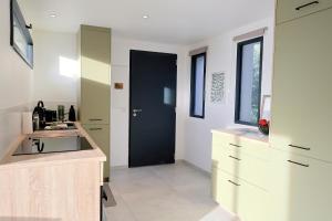 Køkken eller tekøkken på A Macchia - T2 nature & couché de soleil