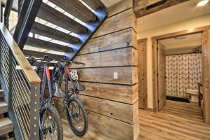 a bike parked on the wall of a room at Luxury Red Lodge Retreat Hot Tub Downtown in Red Lodge +72 photos