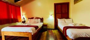 Postel nebo postele na pokoji v ubytování PLAZA cusco Amankay