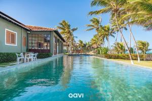 Πισίνα στο ή κοντά στο Casa Beira-Mar com Piscina em Jacumã by Qavi