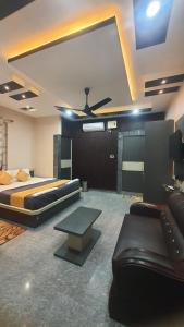 Χώρος καθιστικού στο Kaziranga Guest House KOHORA