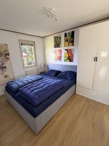 Ένα ή περισσότερα κρεβάτια σε δωμάτιο στο Vakantiepark Klein Vink - 25A