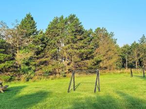 a field with a soccer net in the grass at Luxury Retreat near Beach - By Traum Ferienwohnungen in Husby +84 photos