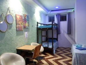 Ένα ή περισσότερα κρεβάτια σε δωμάτιο στο Pousada Recanto Dom Lázaro +132 φωτογραφίες