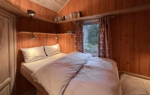 Ένα ή περισσότερα κρεβάτια σε δωμάτιο στο 4 Bedroom Nice Home In Trysil