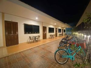 a row of bikes parked next to a building at Na Soi 5 Chiangkhan in Chiang Khan