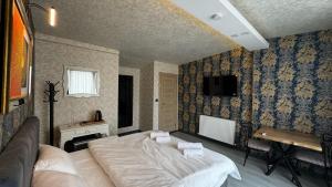 Ένα ή περισσότερα κρεβάτια σε δωμάτιο στο Tuzla Sahil Enjoy Hotel