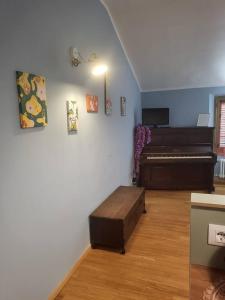 a living room with a couch and a bed at Elegante Suite in Centro Torino · Self Check-in in Turin
