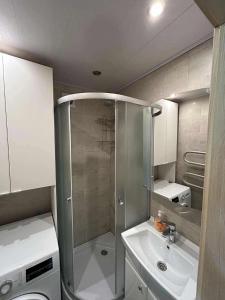 Ένα μπάνιο στο ROŽĖS BUTAS Apartment