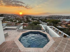 Swimmingpoolen hos eller tæt på Luxury Condos I Parroquia View & Rooftop Jacuzzi I Paseo del Centro Condominio Boutique