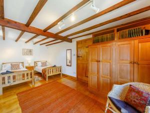 a living room with two beds and a couch at 2 Bed in Hexham 88443 in Acomb